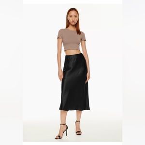 Babaton
Slip Maxi Skirt
High-waisted maxi slip skirt
